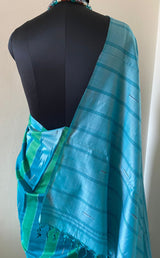 TANUJA- A STUNNING ART SILK SAREE WITH GREEN AND LIGHT BLUE VERTICAL STRIPES AND A BEAUTIFUL TEMPLE BORDER