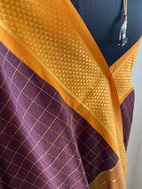 SUKANYA- A BEAUTIFUL SILK COTTON SAREE IN SNUFF BROWN COLOUR WITH CHECKS ALL OVER AND BRIGHT YELLOW BORDER