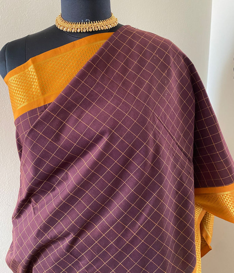 SUKANYA- A BEAUTIFUL SILK COTTON SAREE IN SNUFF BROWN COLOUR WITH CHECKS ALL OVER AND BRIGHT YELLOW BORDER