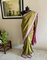 TARUNI- GREEN SELF-WEAVE CHECKS POCHAMPALLY SAREE WITH A BEAUTIFUL OFFWHITE AND MAROON FULL WEAVE BORDER AND A STUNNING MAROON IKKAT AANCHAL