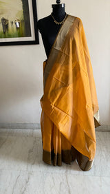 POORNIMA- A SOFT MUSTARD CHANDERI WITH CONTRAST BROAD BORDERS IN BROWN, RUNNING BLOUSE PIECE