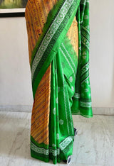 DYUTIMA- EMBRACE THE GRACE OF A PRINTED PATLI SILK SAREE IN OCHRE AND GREEN