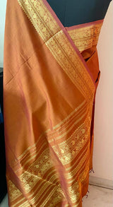 AADHYA- A GORGEOUS SILK COTTON WITH ZARI IN AN UNUSUAL HONEY COLOUR WITH MOTIFS OF PEACOCKS AND MANGO LEAVES