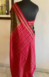 SAUDAMINI- AN ODISHA HANDLOOM IKKAT SAREE IN OLIVE GREEN WITH SMALL SHELL DESIGN MOTIFS AND A GORGEOUS BRIGHT RED WOVEN BORDER AND AANCHAL