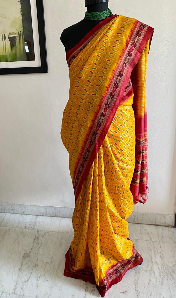 SONAKSHI- A RADIANT YELLOW PATOLA SILK SAREE, A TAPESTRY IN ELEGANCE AND CHARM