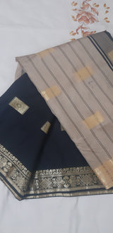 NEESHA- A COTTON SILK BLEND SAREE WITH GOLD MOTIFS IN THE BORDER AND AANCHAL OVER THE BLACK BASE