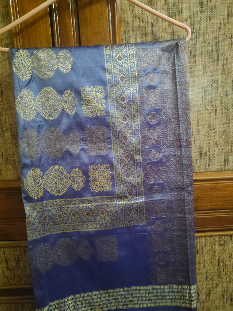 URMILA- A VIOLET, SILK SAREE WITH GOLDEN ZARI WORK ALL OVER THE BODY, BORDER AND A FULLY WOVEN AANCHAL