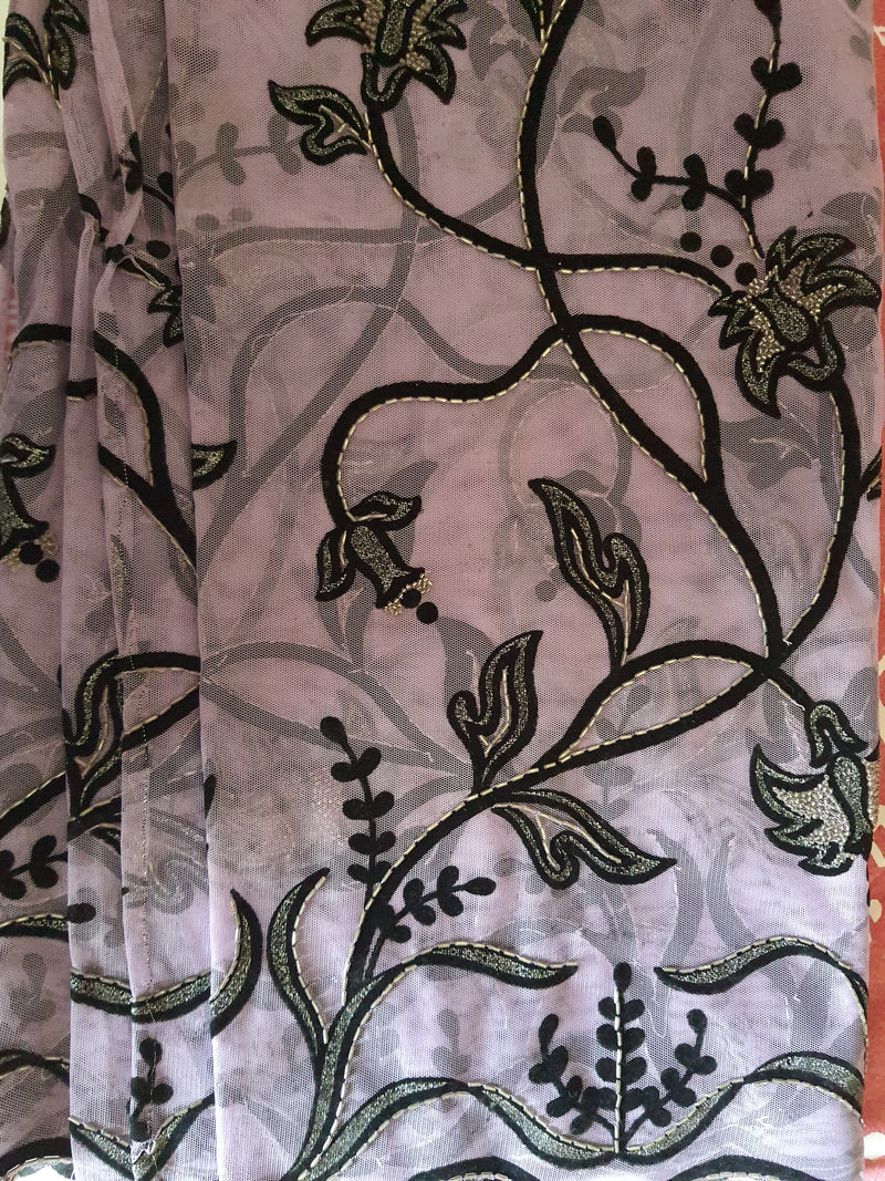 NAZNEEN- A BEAUTIFUL VERY LIGHT MAUVE AND BLACK NET SAREE WITH APPLIQUE WORK ON IT