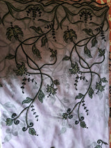 NAZNEEN- A BEAUTIFUL VERY LIGHT MAUVE AND BLACK NET SAREE WITH APPLIQUE WORK ON IT