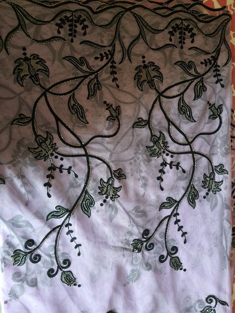 NAZNEEN- A BEAUTIFUL VERY LIGHT MAUVE AND BLACK NET SAREE WITH APPLIQUE WORK ON IT