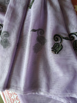 NAZNEEN- A BEAUTIFUL VERY LIGHT MAUVE AND BLACK NET SAREE WITH APPLIQUE WORK ON IT