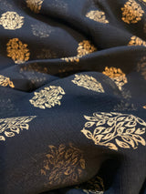 KALI PARI- A BEAUTIFUL BLACK CHIFFON SAREE WITH KHADI WORK MOTIFS IN THE BODY AND THIN GOLD WEAVE BORDER EXTENDING TO THE AANCHAL