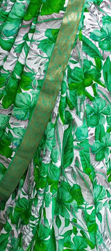 MAYA- A PURE CHIFFON SAREE WITH FLORAL GREEN PATTERNS