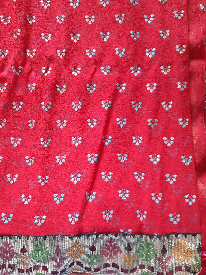 UJJWALA- A RED PURE GEORGETTE SAREE AND ATTACHED BORDER WITH GOLD PRINT ON IT