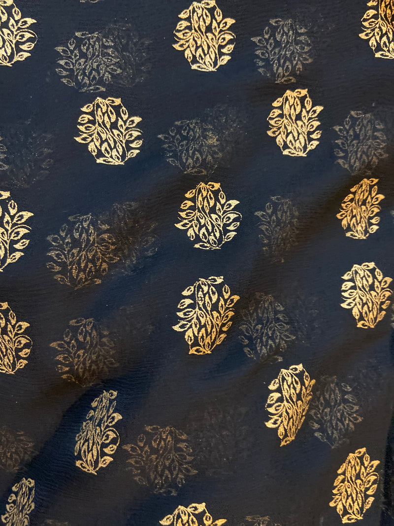 KALI PARI- A BEAUTIFUL BLACK CHIFFON SAREE WITH KHADI WORK MOTIFS IN THE BODY AND THIN GOLD WEAVE BORDER EXTENDING TO THE AANCHAL