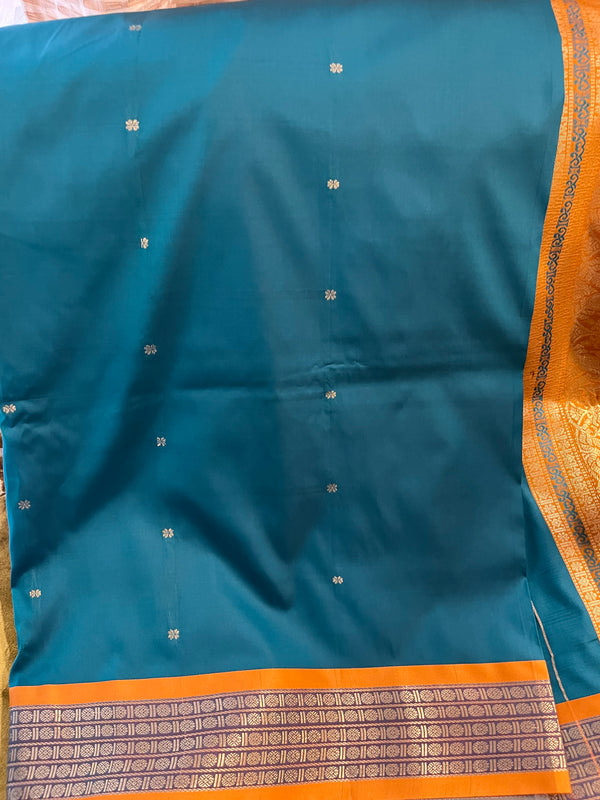 KAILANI- A SOUTH SILK SAREE IN TEAL WITH A MUSTARD OCHRE BORDER AND FULLY WOVEN AANCHAL
