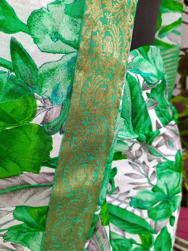 MAYA- A PURE CHIFFON SAREE WITH FLORAL GREEN PATTERNS