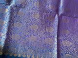 SWAPNALI- A GORGEOUS BLUE COLOUR SILK SAREE WITH SMALL ZARI BOOTIS, GOLD AND PURPLE BORDER AND A FLORAL PURPLE AND GOLD WEAVE AANCHAL