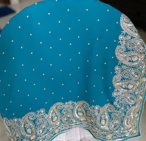 SAPNA- A TEAL BLUE COLOUR GEORGETTE CREPE SARI WITH SEQUINS
