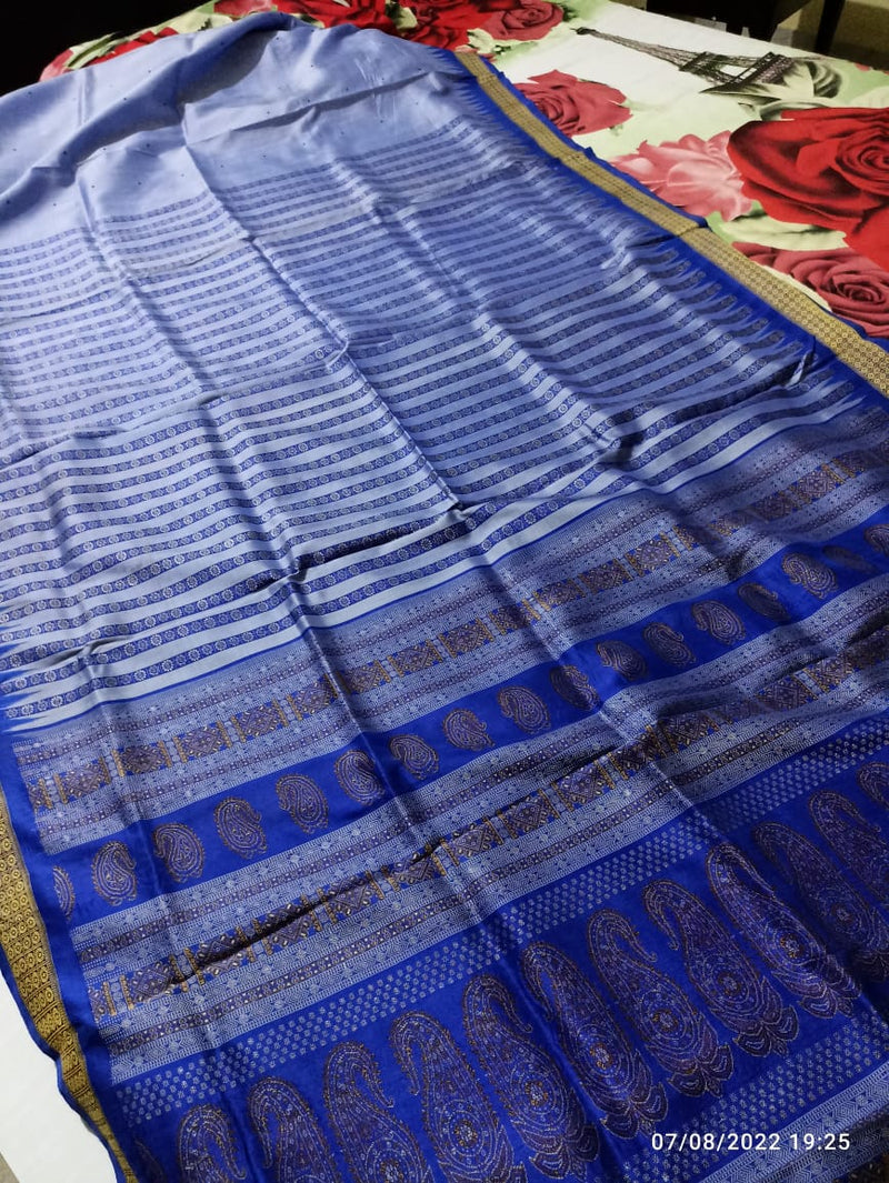 IONE- A BEAUTIFUL HANDLOOM SAMBALPURI PURE SILK SAREE WITH A LIGHT PURPLE BODY AND A DARKER PURPLE BORDER AND DOUBLE AANCHAL IN STRIPES