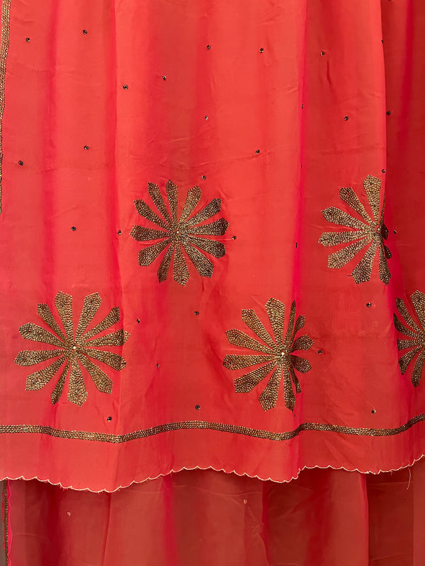 SUHAAG- A BEAUTIFUL RED SAREE IN A GEORGETTE CREPE BLEND, WITH SEQUINS ALL OVER THE BODY AND FLORAL SEQUINS IN THE AANCHAL