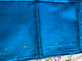 SWAPNALI- A GORGEOUS BLUE COLOUR SILK SAREE WITH SMALL ZARI BOOTIS, GOLD AND PURPLE BORDER AND A FLORAL PURPLE AND GOLD WEAVE AANCHAL