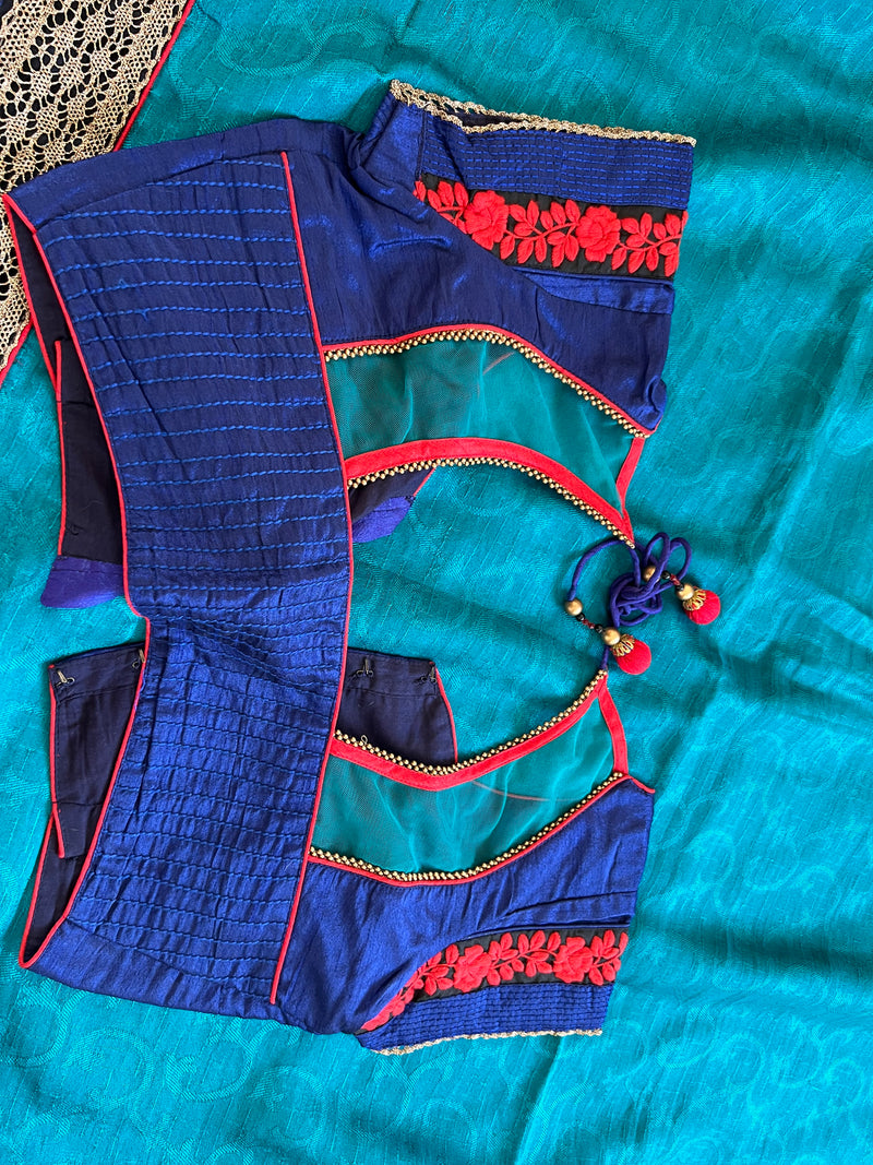 ROMA- A VIBRANT BLUE COTTON SILK SAREE WITH A DARKER BLUE EDGING AND ELABORATE THREE LAYERED BORDER