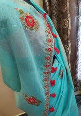 JAL PARI- A BLUE PURE LINEN SAREE WITH CONTRAST RED COLOURED EMBROIDERED BLOUSE PIECE