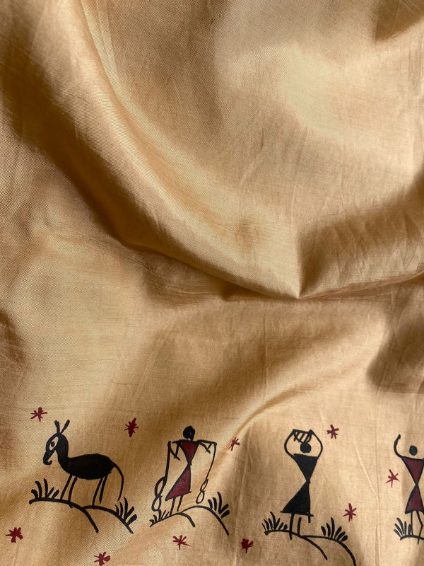 JAANKI- A BEIGE ASSAM SILK SAREE WITH MULTI-COLOURED HANDPAINTED TRIBAL ART IN THE BORDER AND AANCHAL