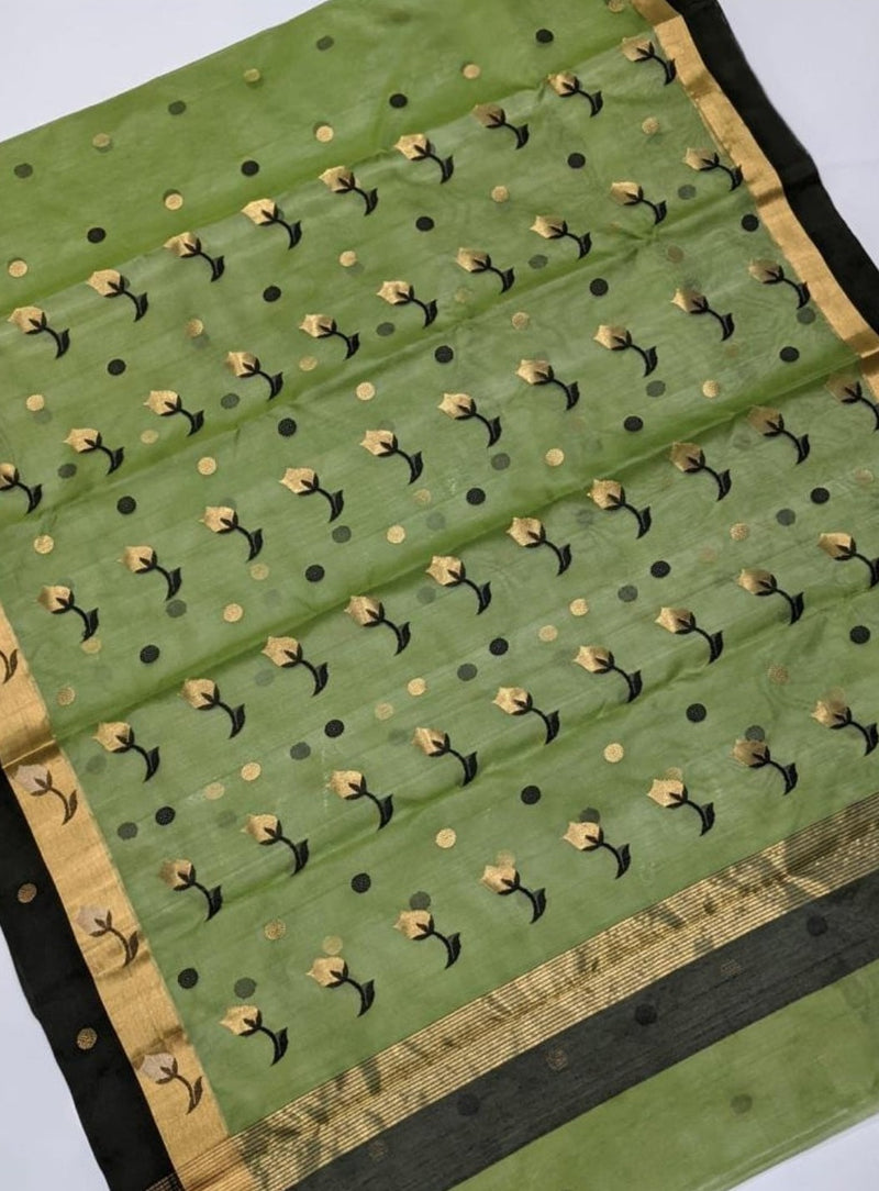 IRATI- A GORGEOUS GREEN CHANDERI SAREE WITH BLACK AND GOLD ZARI BORDER AND BEAUTIFUL MOTIFS IN THE AANCHAL