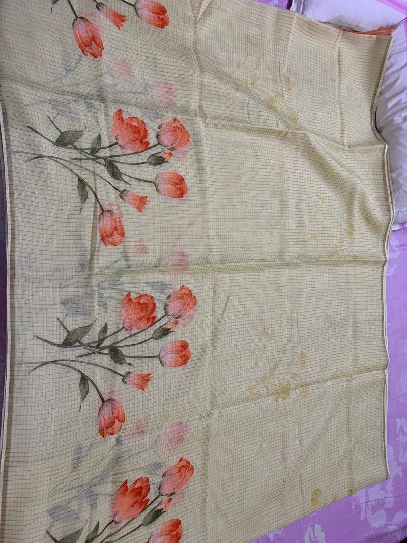 GOMATI- A BEAUTIFUL OFFWHITE COTTON SAREE WITH FLORAL MOTIFS ALL THROUGH THE SAREE