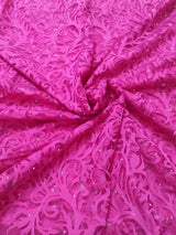 AFSANA- A PINK NET SAREE WITH FLORAL DESIGN, SEQUINS AND GOLDEN ZARI BORDER