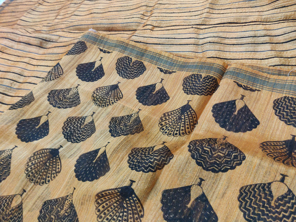 SOUBHAGYA- A GOLDEN MUSTARD TUSSAR SILK BLEND SAREE WITH PEACOCK MOTIFS IN BLUISH BLACK
