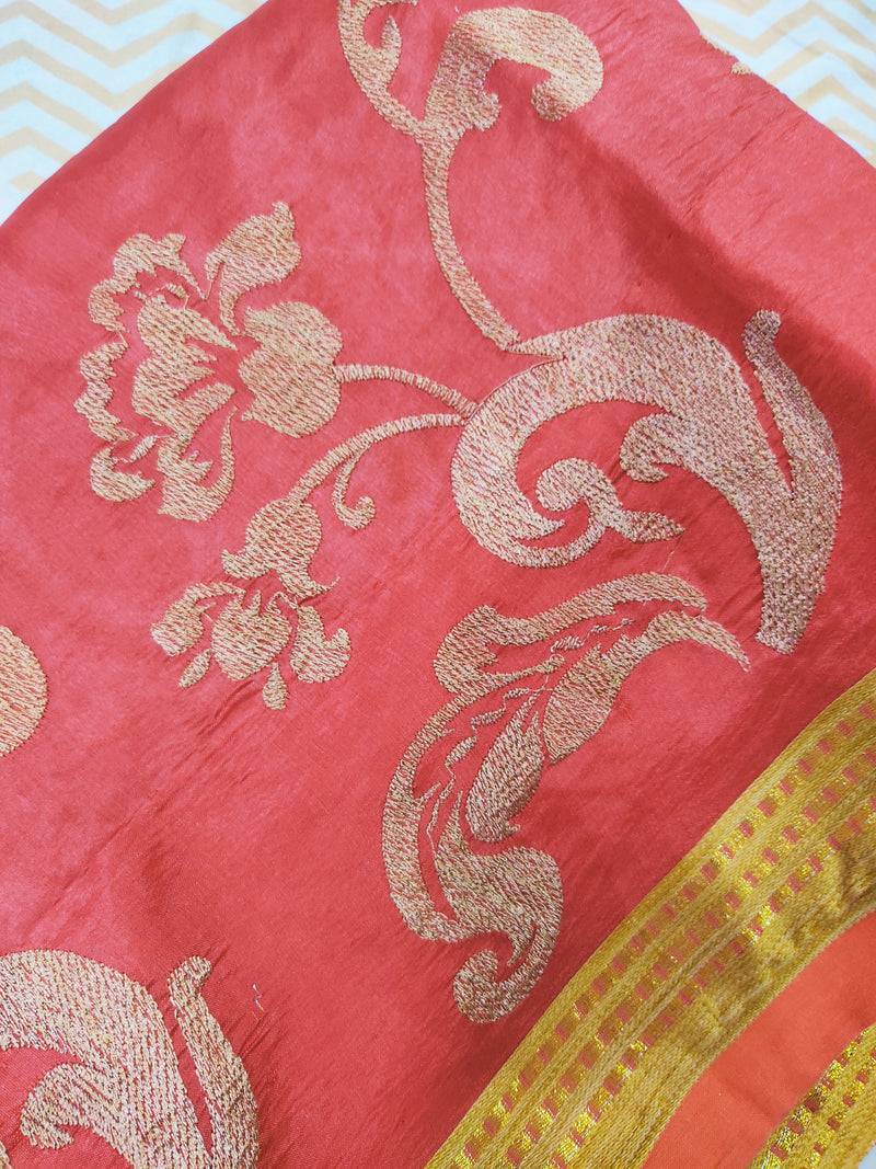 NAVODHA- A PEACH SILK SAREE WITH DULL GOLD FLORAL EMBROIDERY, GOLD ZARI BORDER AND HEAVY WORK IN THE AANCHAL