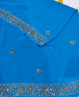 BASANTI- A BEAUTIFUL, TEAL BLUE CHIFFON SAREE WITH EMBROIDERED FLOWERS IN THE BODY AND BORDER WITH HEAVY EMBROIDERY IN THE AANCHAL