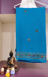 BASANTI- A BEAUTIFUL, TEAL BLUE CHIFFON SAREE WITH EMBROIDERED FLOWERS IN THE BODY AND BORDER WITH HEAVY EMBROIDERY IN THE AANCHAL