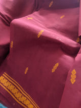 RUTUJA- A TRADITIONAL COIMBATORE COTTON SAREE IN MAROON WITH MUSTARD YELLOW BOOTIS AND BORDER