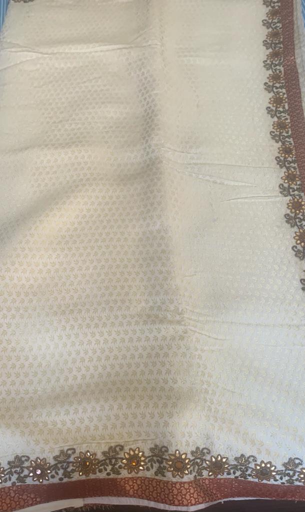AAINA- A SELF WEAVE, CREAM COLOURED TANCHOI SILK WITH EMBELLISHMENTS AND MIRROR WORK