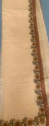 AAINA- A SELF WEAVE, CREAM COLOURED TANCHOI SILK WITH EMBELLISHMENTS AND MIRROR WORK