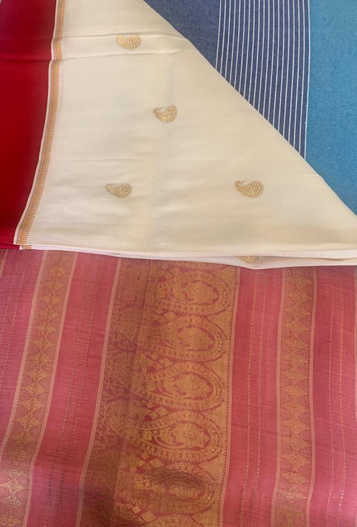 POOJA- A CREAM AND RED BENGAL SILK SAREE WITH ZARI BOOTIS ALL OVER THE BODY AND A ZARI AANCHAL