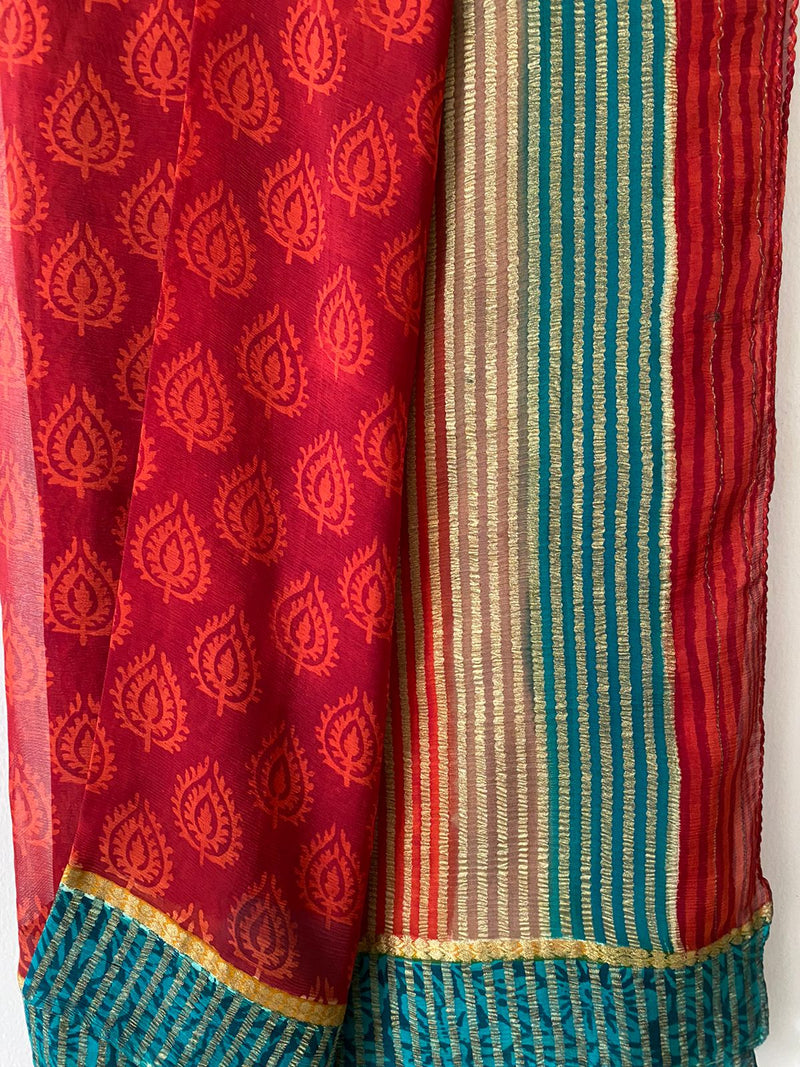 AALIA- A BEAUTIFUL PRINTED PURE CHIFFON IN RED WITH A GREEN BORDER