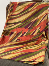 SWARNA- AN ELEGANT PURE SILK SAREE WITH FLORAL PRINTS, OVER A COLOURFUL BASE OF ECLECTIC ZIG ZAGS
