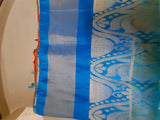 RUDHIRA- A SILK BLEND SAREE IN RED WITH GOLD SQAURES AND ALTERNATING BLUE AND GOLD MOTIFS WITHIN, ATTACHED BLOUSE PIECE IN CONTRAST COLOUR